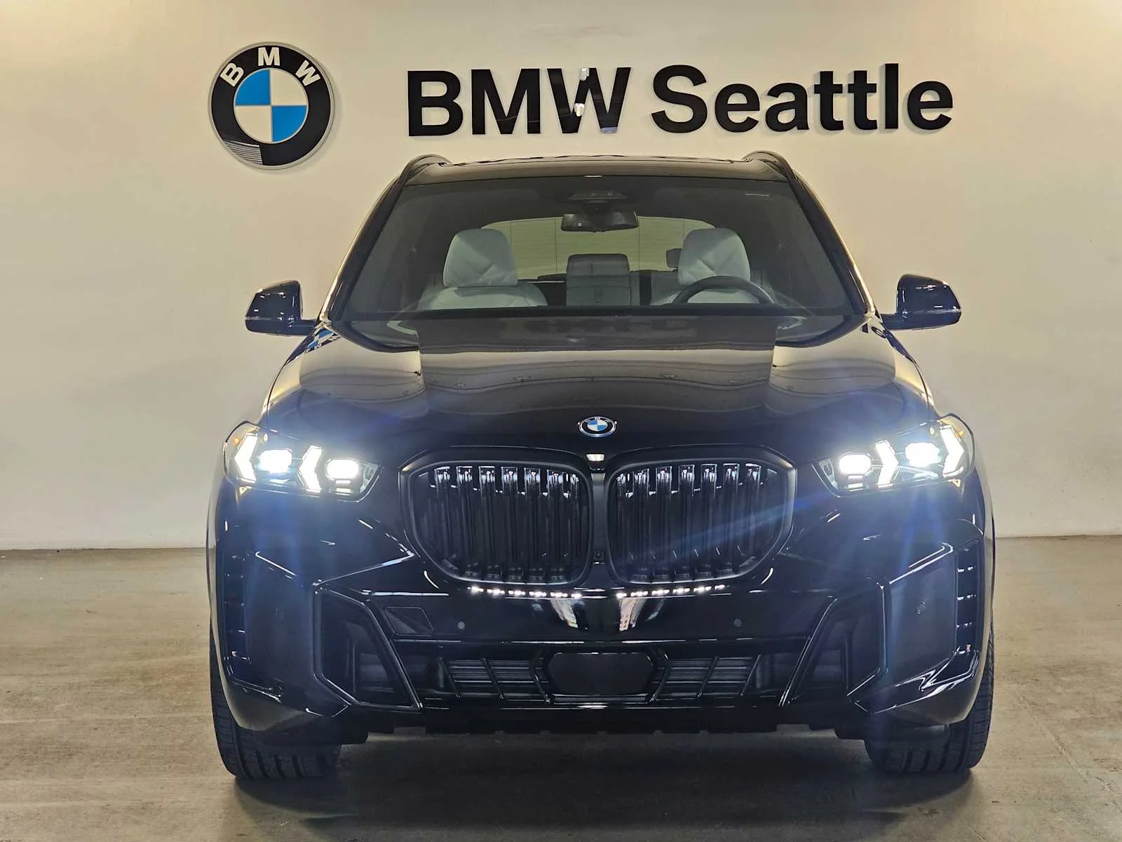 New 2026 Black Sapphire Metallic BMW xDrive50e image 6