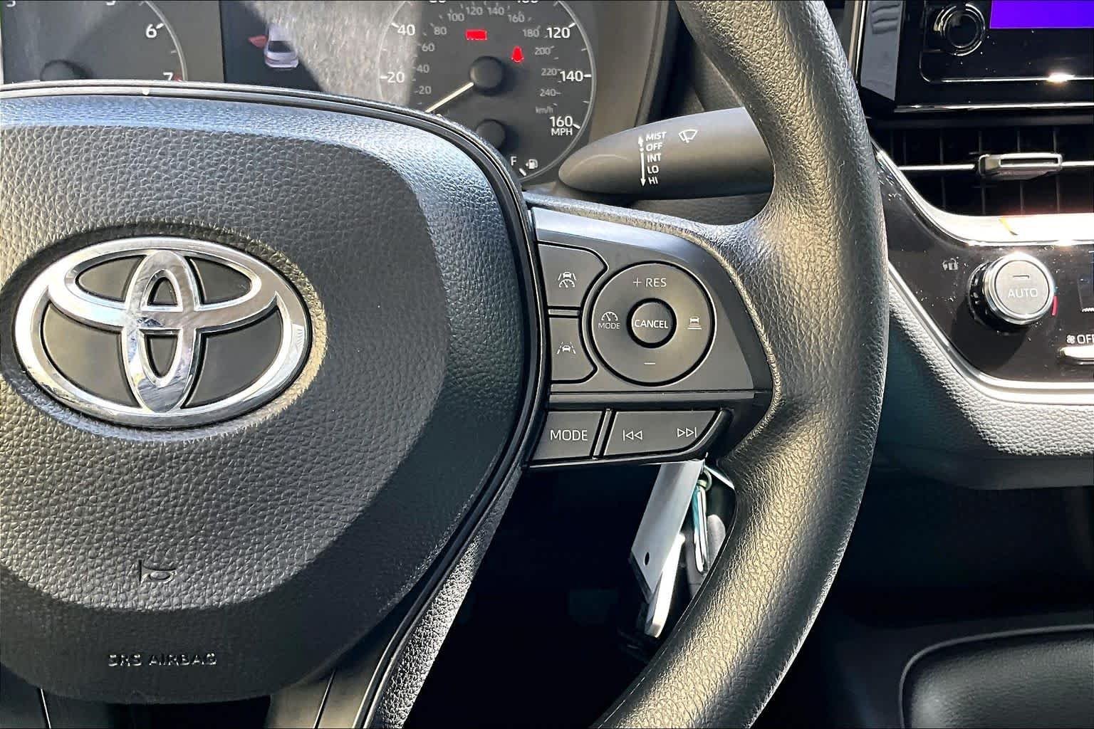 Used 2025 Ruby Flare Pearl Toyota LE image 25