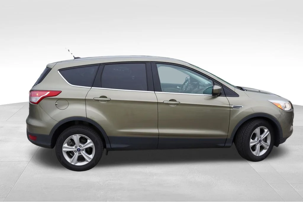 Used 2014 Ginger Ale Metallic Ford SE image 2