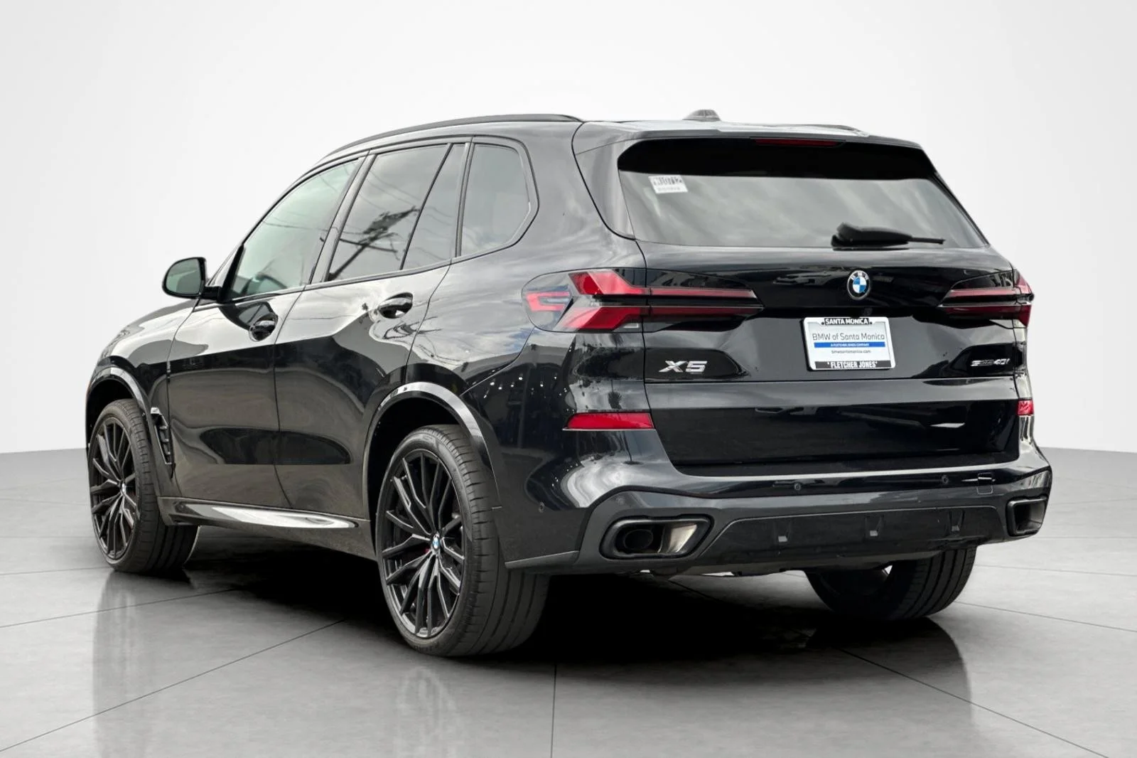 Used 2025 Black Sapphire Metallic BMW sDrive40i image 3