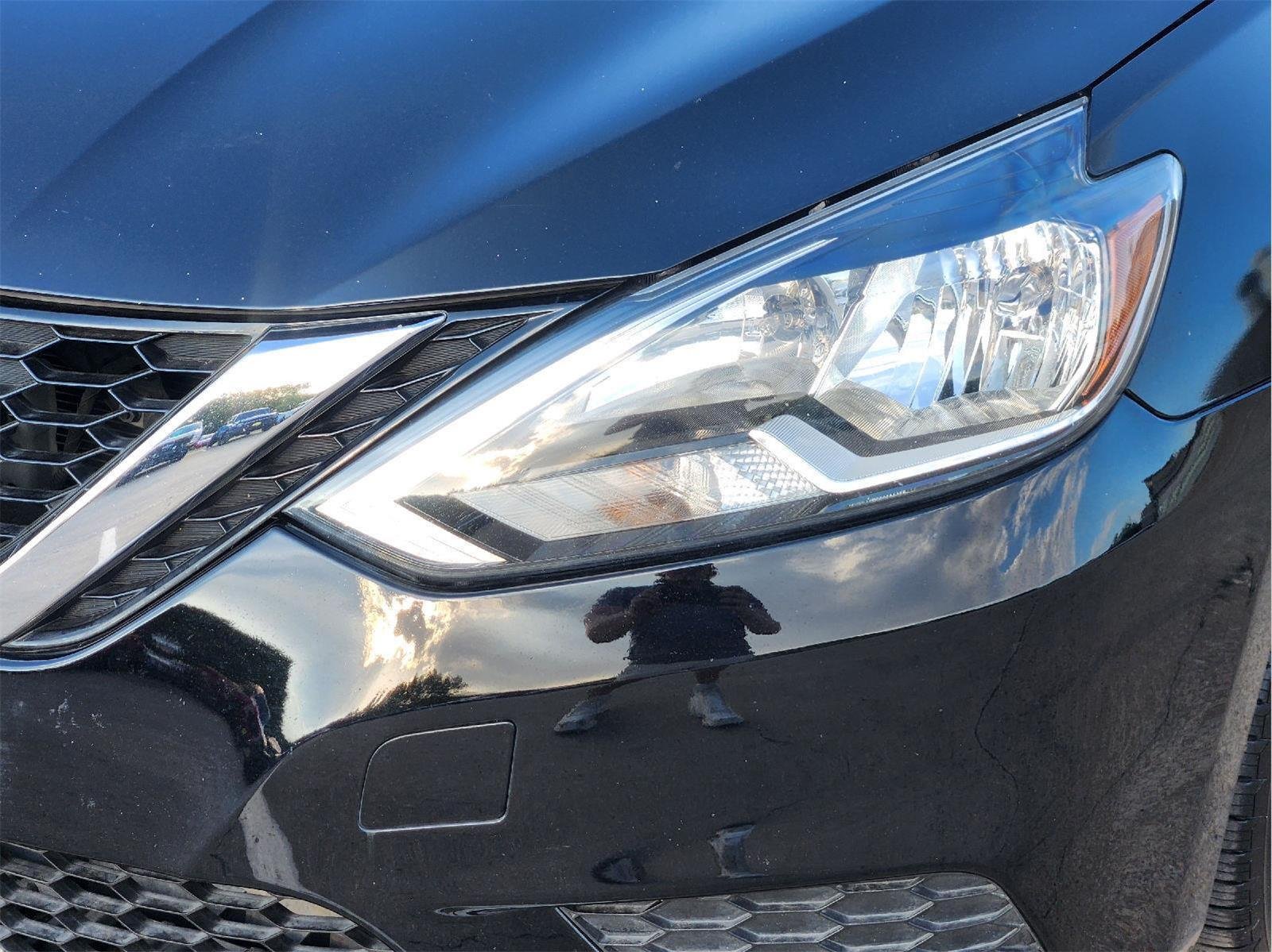 Used 2016 Super Black Nissan SV image 7