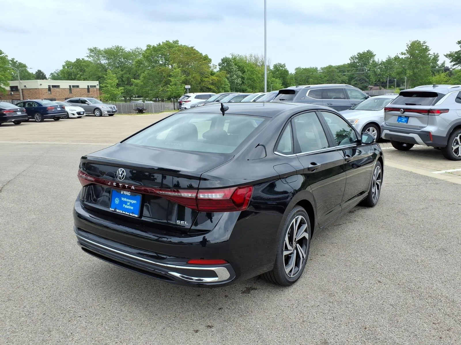 New 2026 Deep Black Pearl Volkswagen SEL AUTO image 7