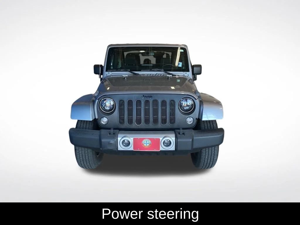 Used 2013 Silver Jeep Sahara image 14