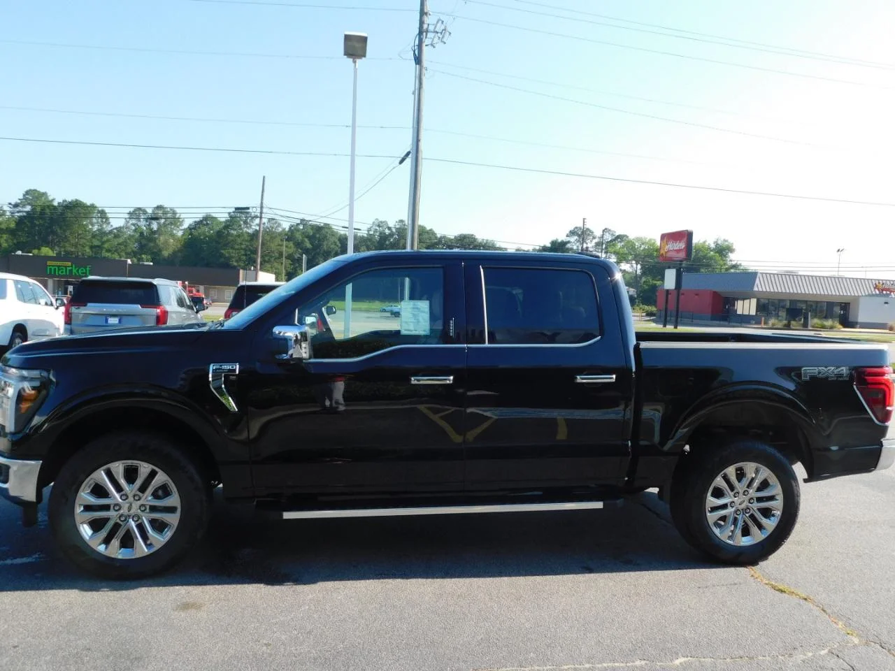 New 2026 Agate Black Metallic Ford Lariat® image 6