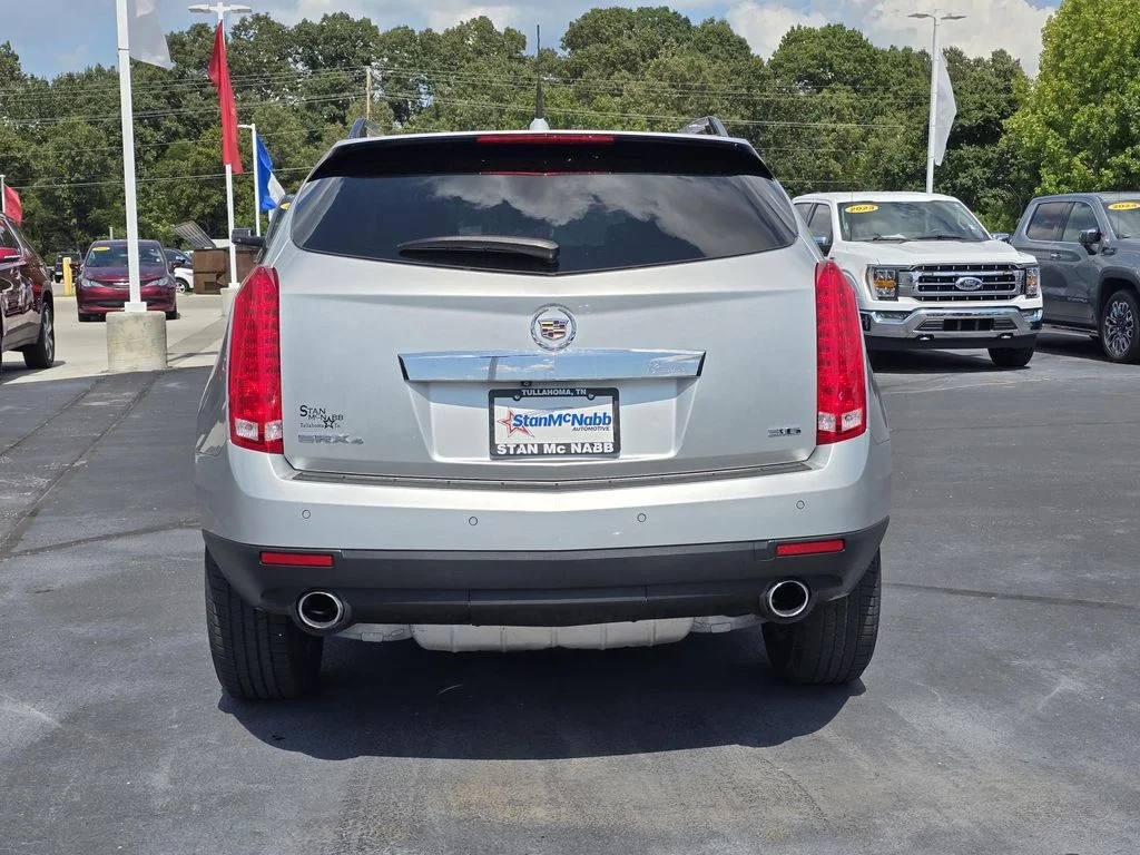 Used 2014 RADIANT SILVER METALLIC Cadillac Luxury Collection image 6