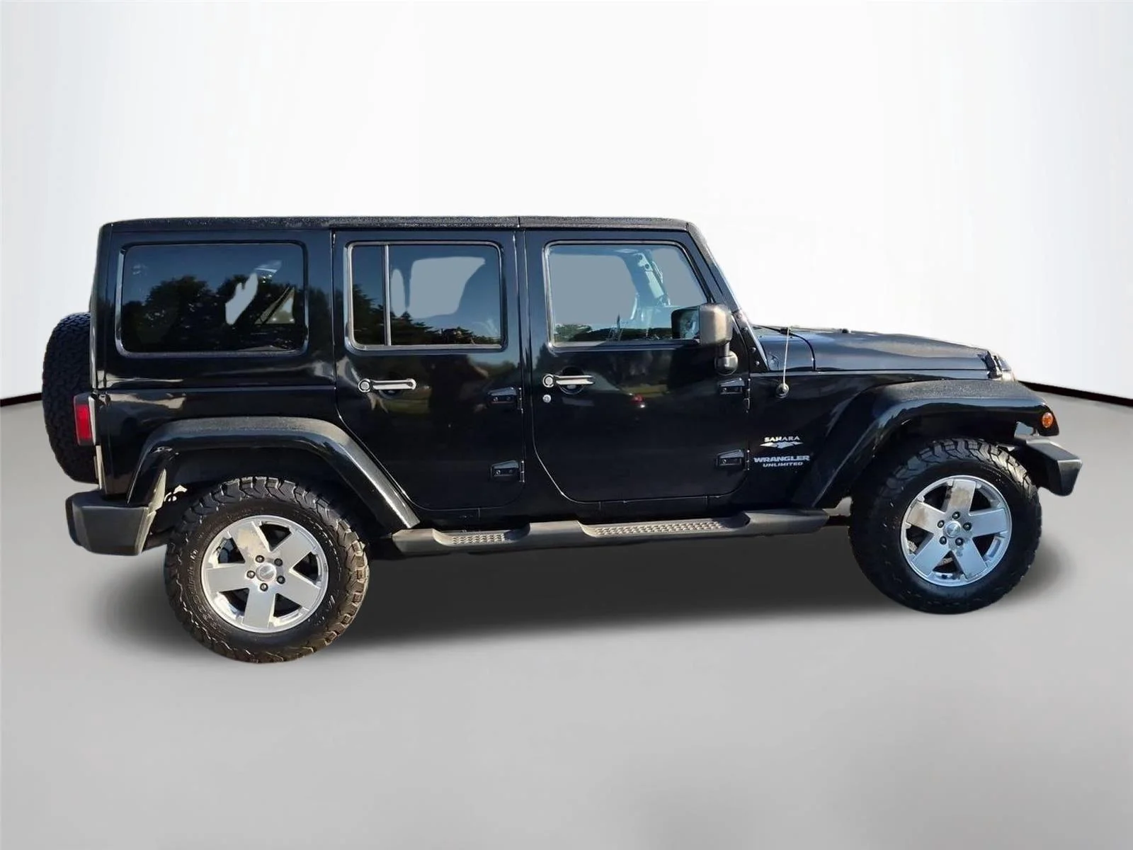 Used 2011 Black Clear Coat Jeep Sahara image 5