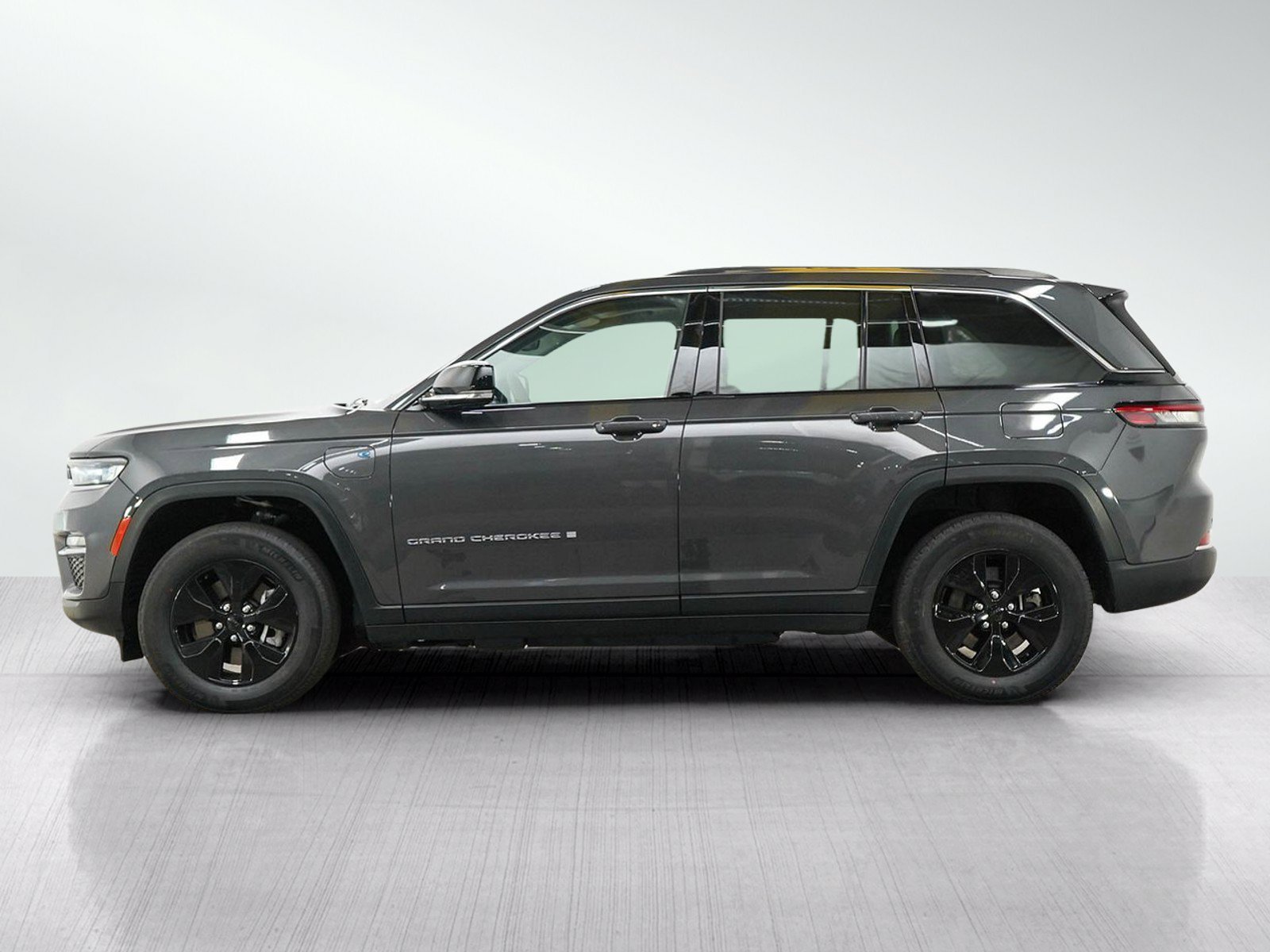 Used 2023 Jeep Grand Cherokee 4xe with VIN 1C4RJYB62PC623553 for sale in Minneapolis, Minnesota