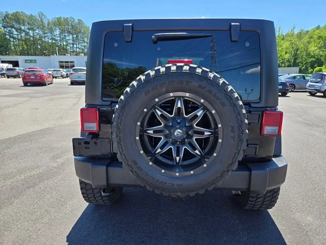 Used 2015 Black Jeep Unlimited Sport image 7