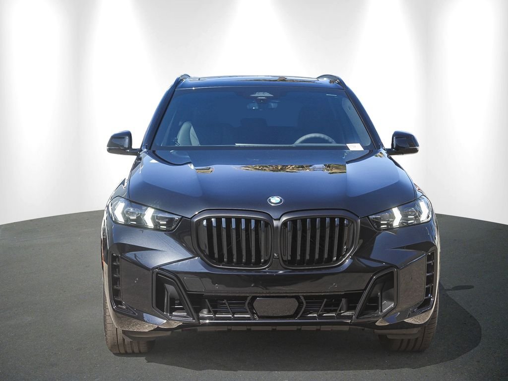 New 2026 Black Sapphire Metallic BMW sDrive40i image 2
