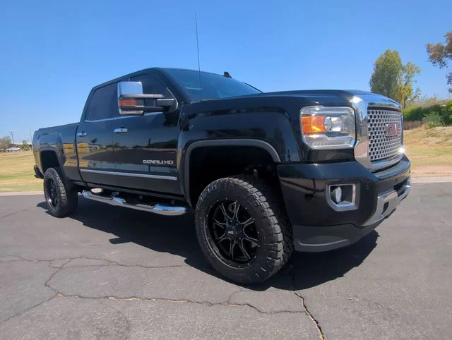 Used 2016 Black GMC Denali image 1