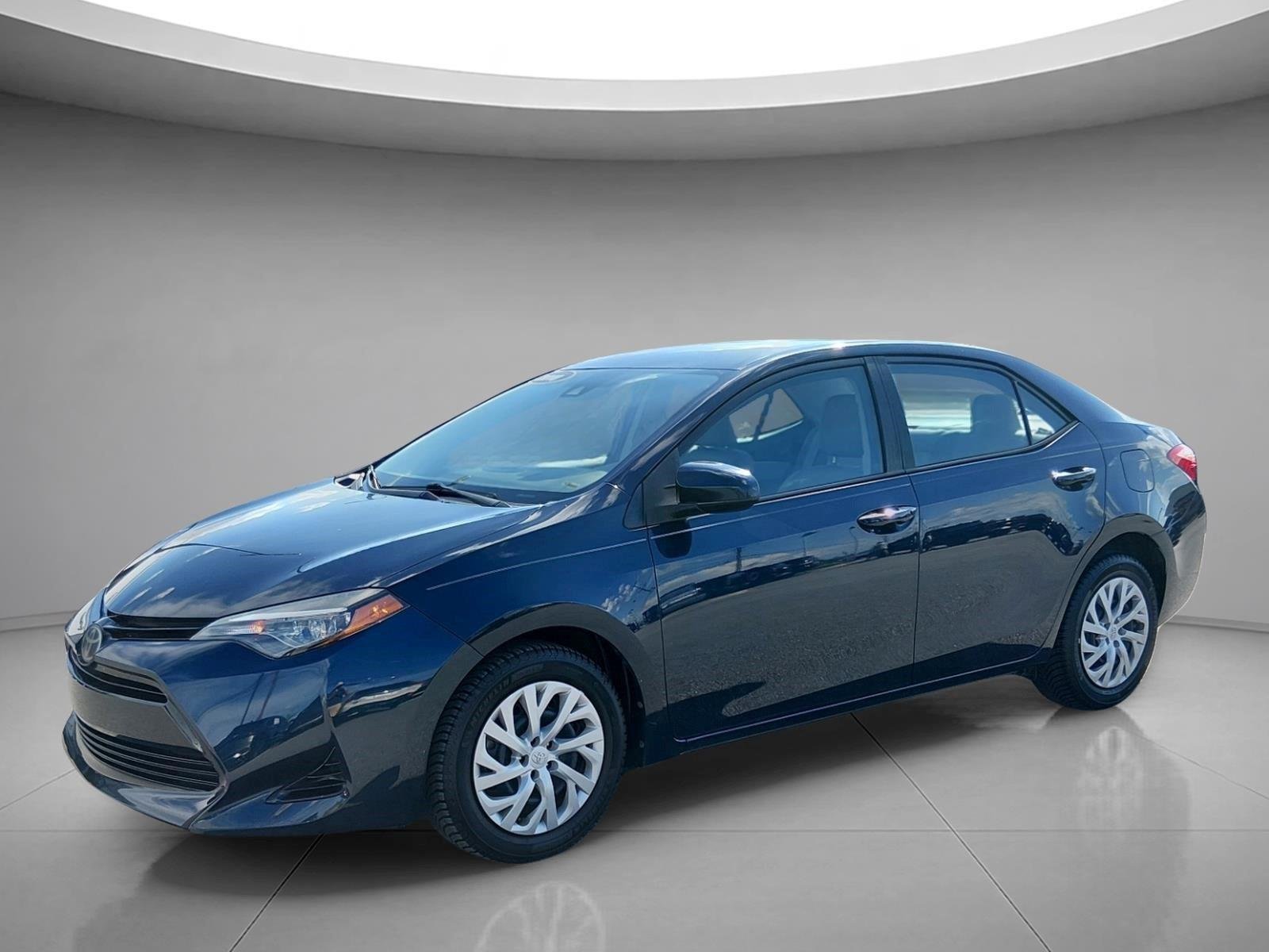 Used 2018 Galactic Aqua Mica Toyota LE image 1