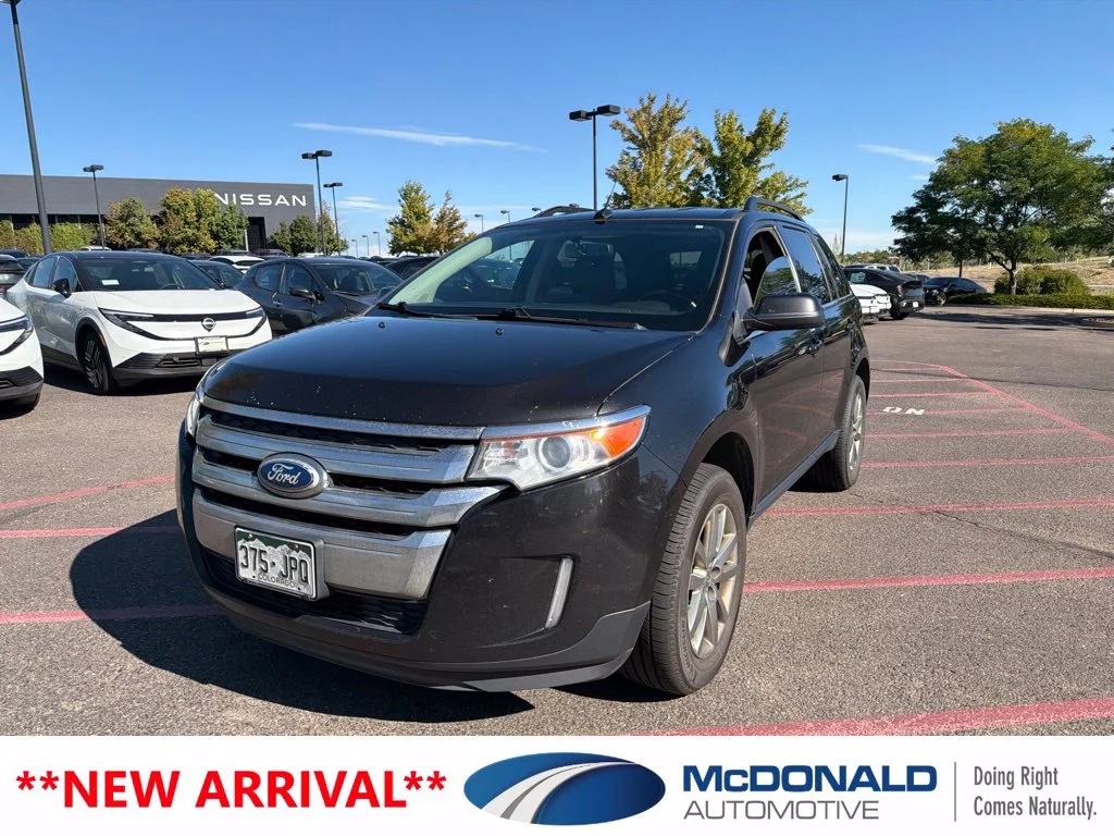 Used 2013 Black Ford Limited image 1