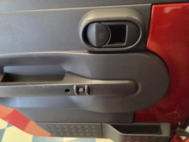 Used 2009 Orange Jeep Unlimited Sahara image 24