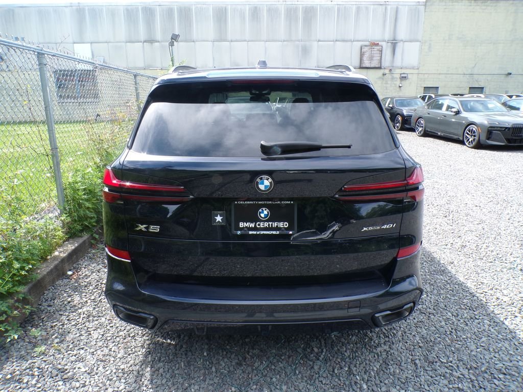 Certified Used 2024 Carbon Black Metallic BMW xDrive40i image 4