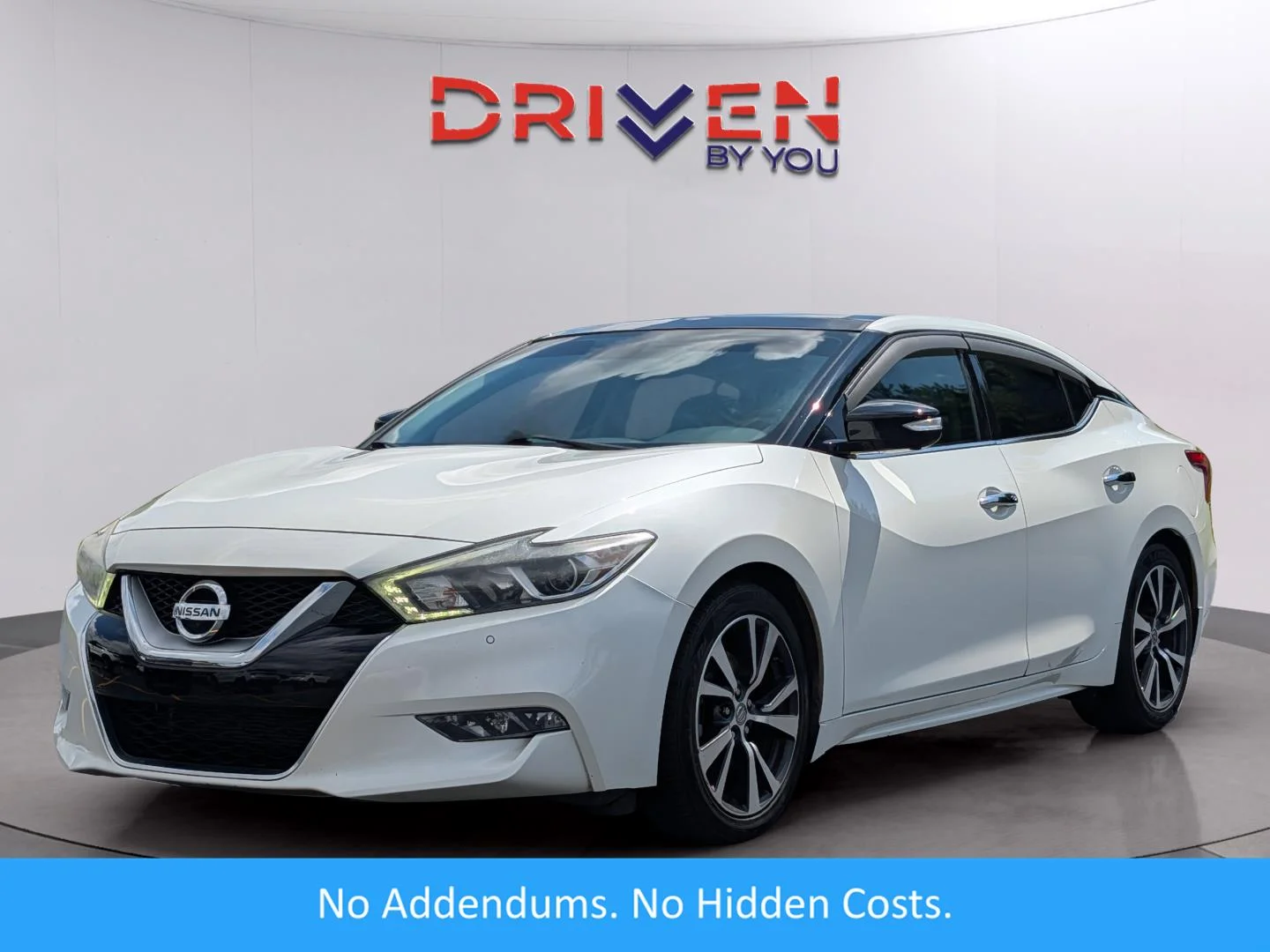 Used 2017 Pearl White Nissan Platinum image 1
