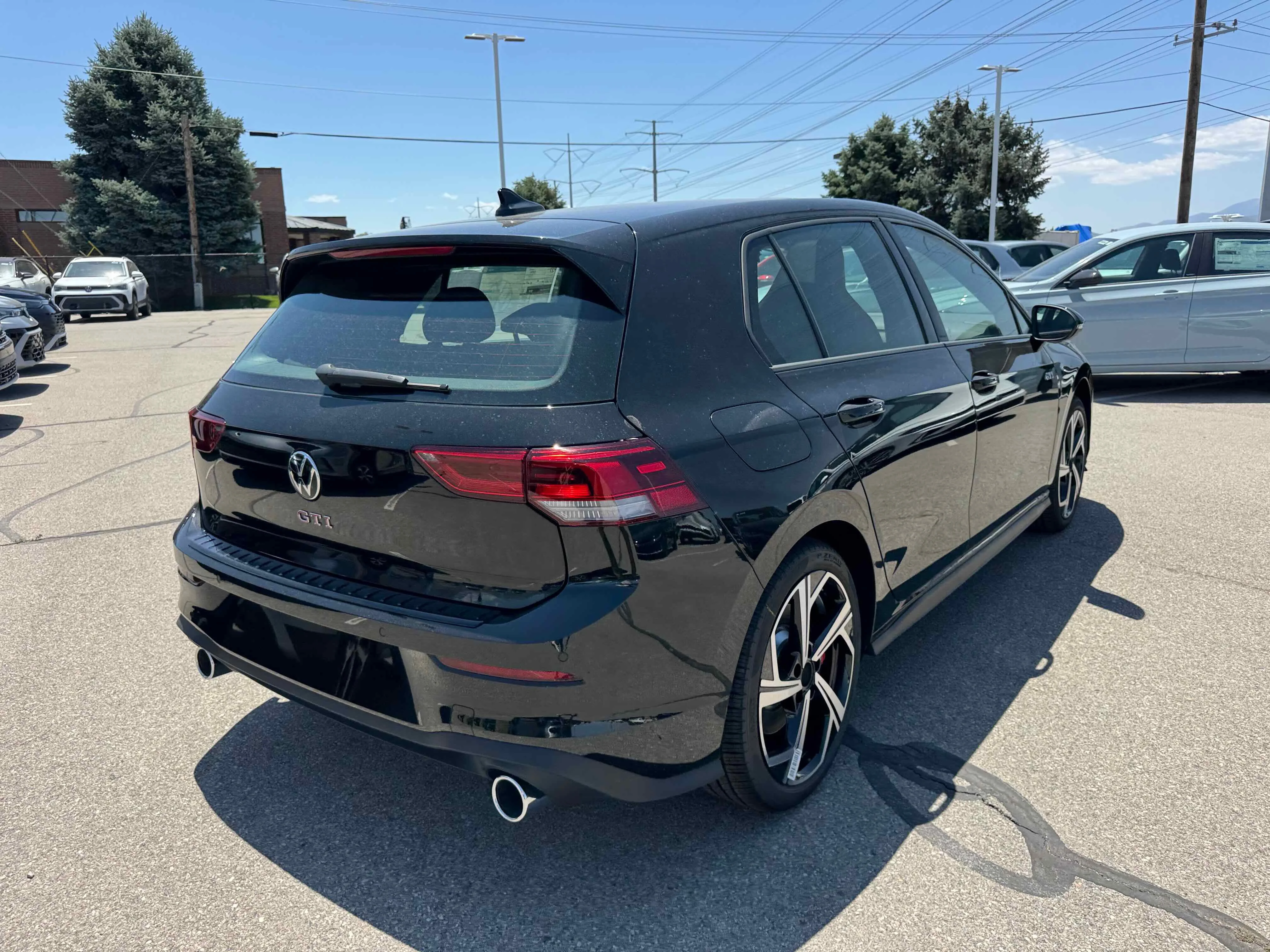 New 2025 Black Volkswagen SE image 7