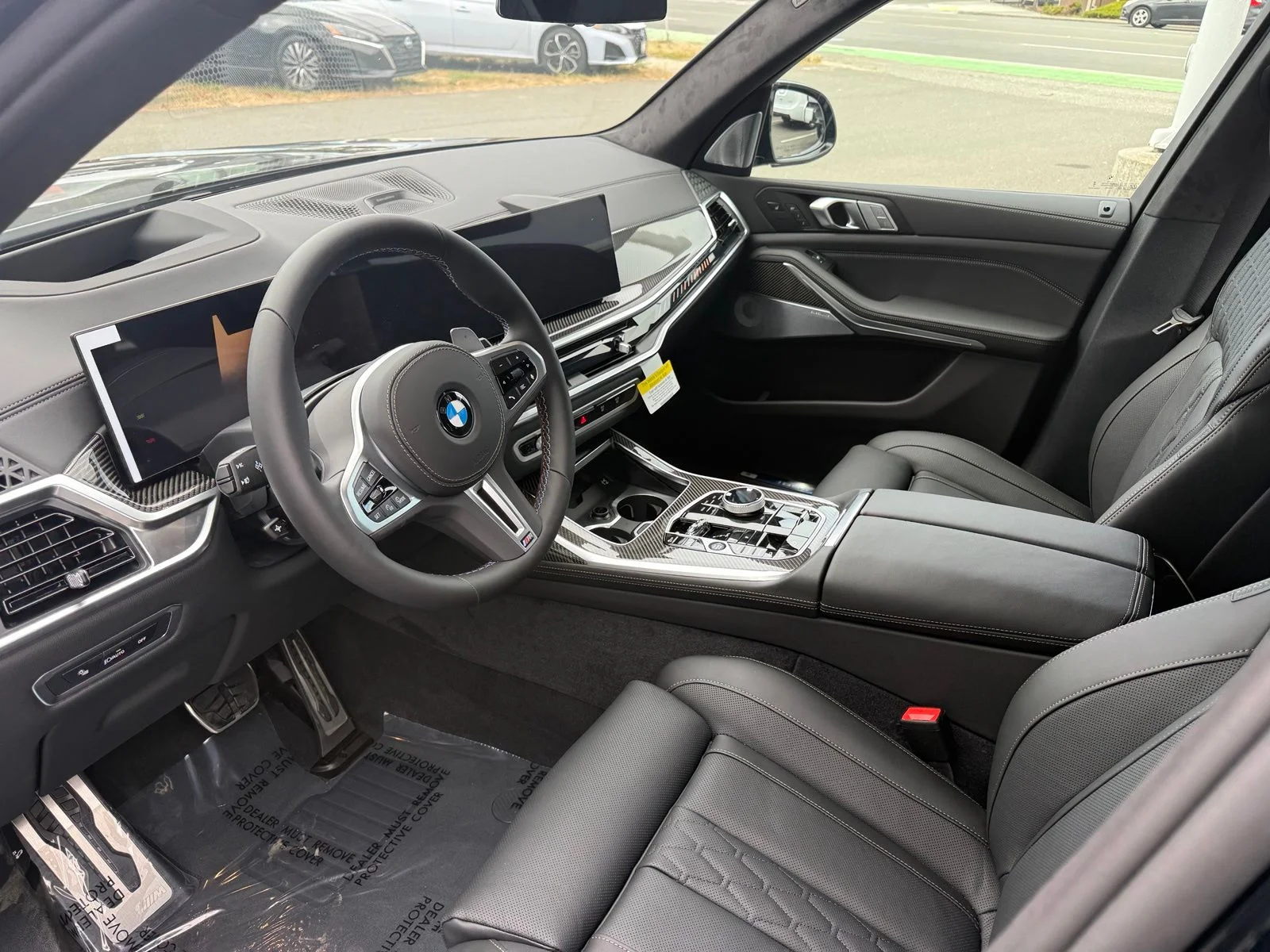 New 2027 Black Sapphire Metallic BMW M60i image 12