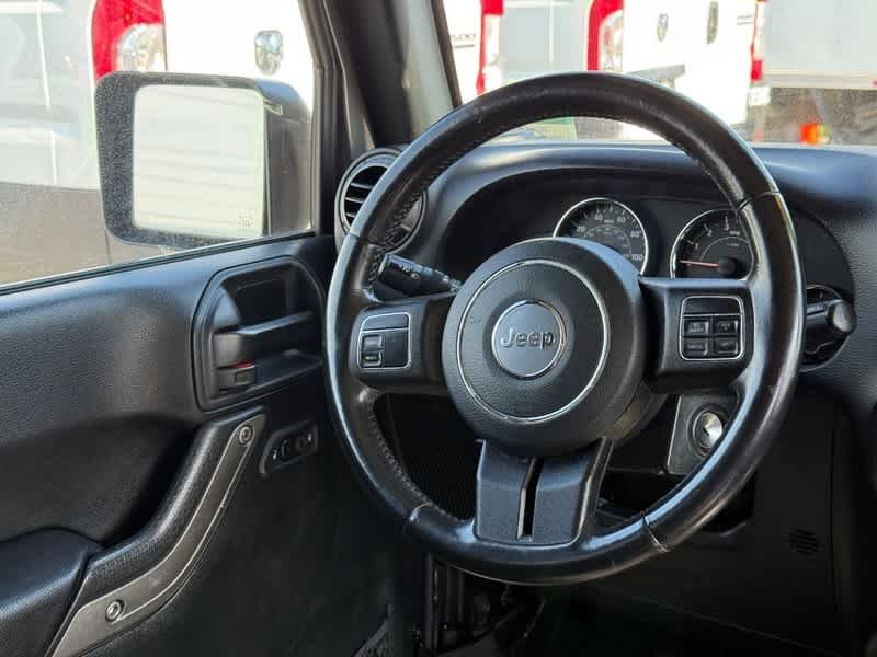 Used 2018 Granite Crystal Metallic Clearcoat Jeep Sport S image 12