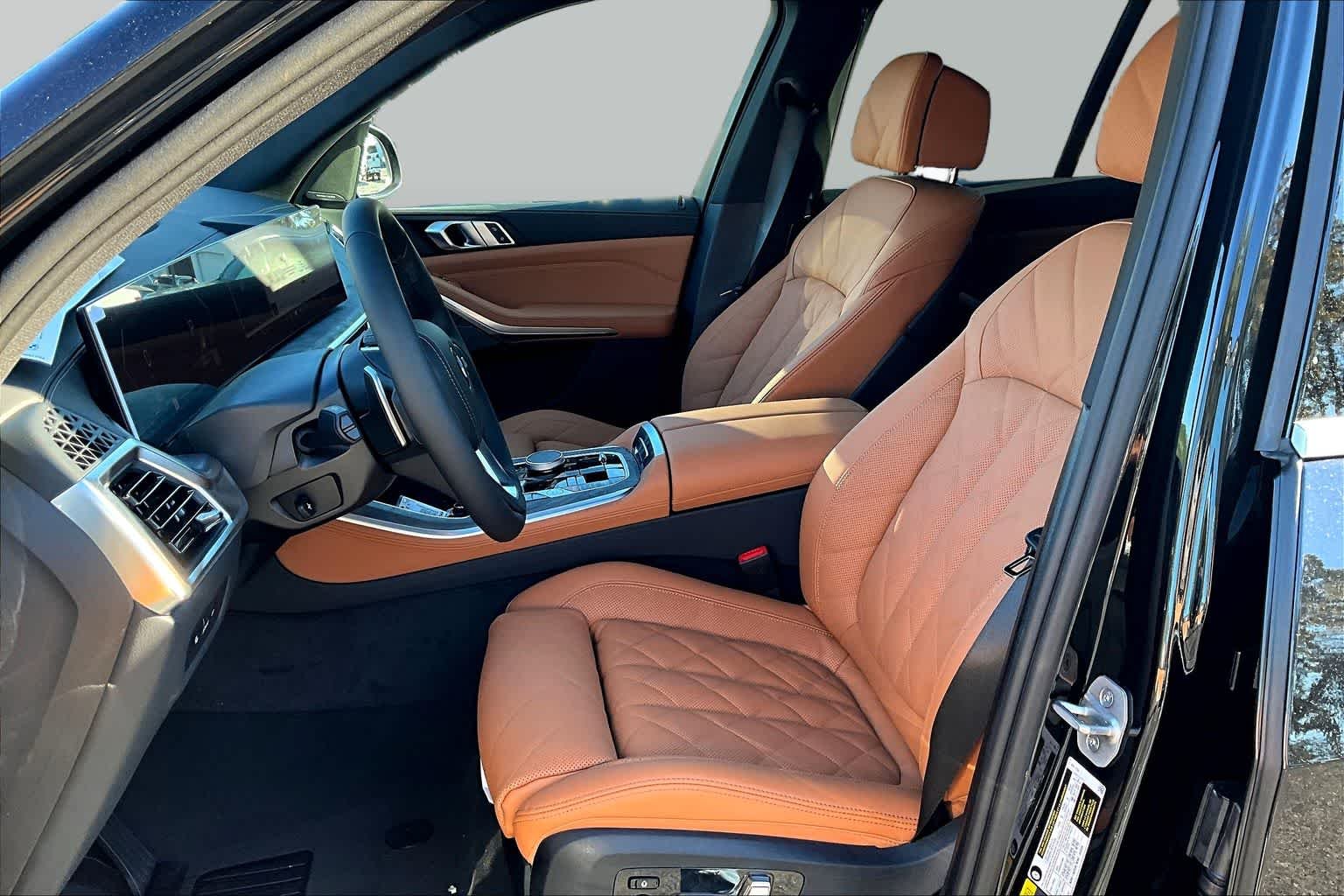 New 2026 Black Sapphire Metallic BMW xDrive50e image 9