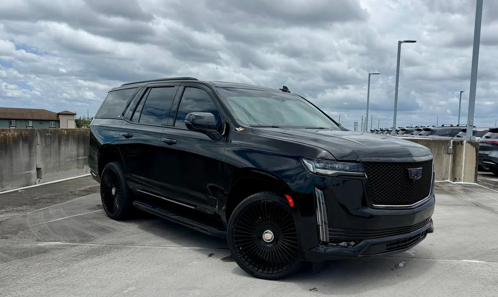 Used 2023 Black Cadillac Sport image 1