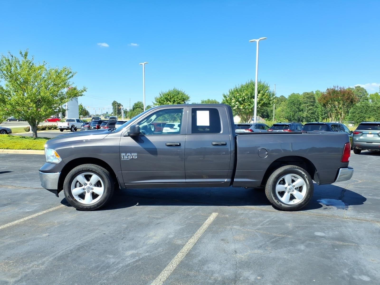 Used 2024 Granite Crystal Metallic Clearcoat Ram SLT image 3