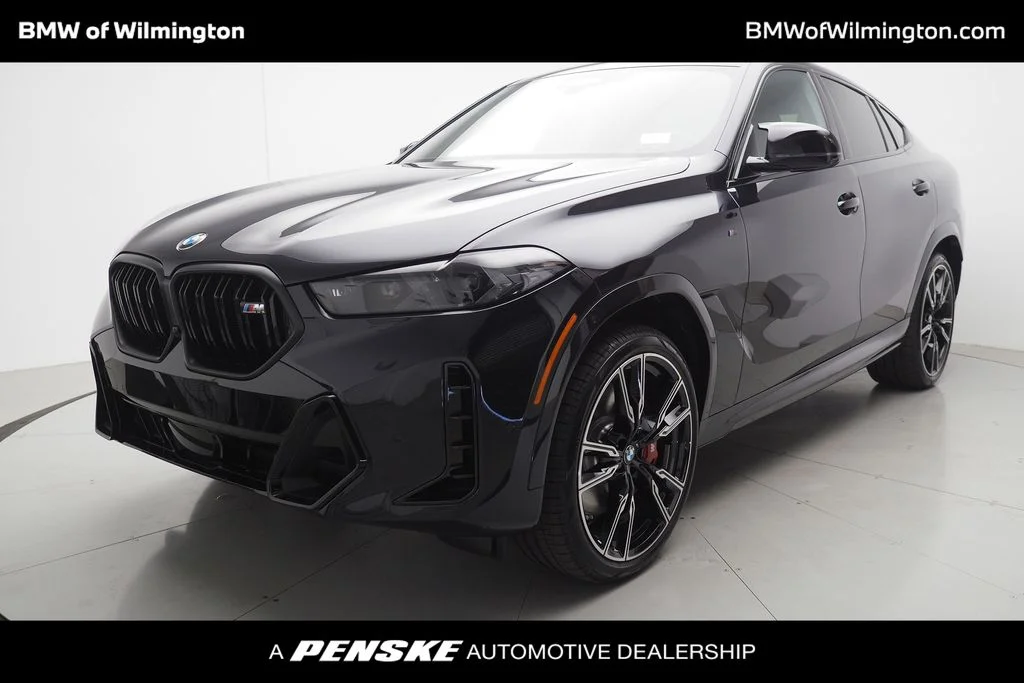 New 2027 Carbon Black Metallic BMW M60i image 1