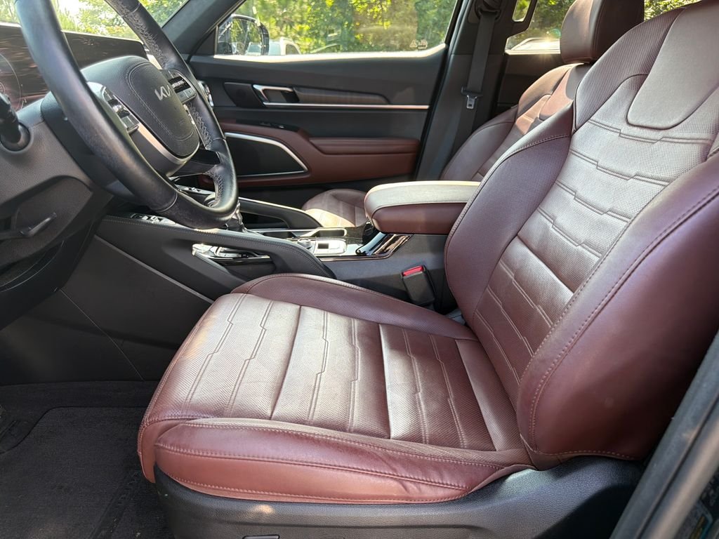 Used 2023 Ebony Black Kia SX-Prestige image 25