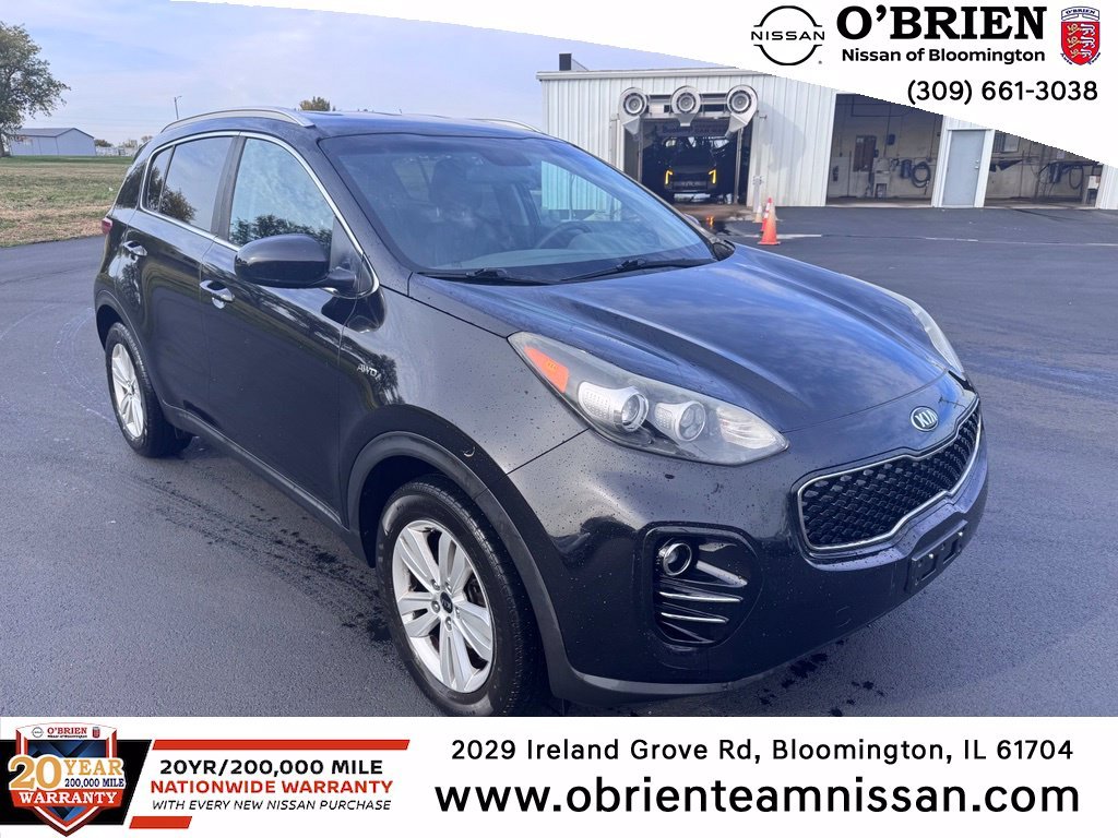 Used 2017 Black Cherry Kia LX image 1