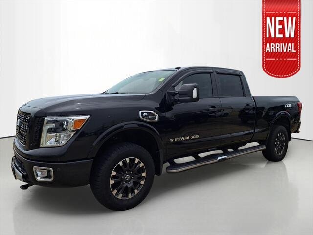Used 2018 Magnetic Black Nissan PRO-4X image 1