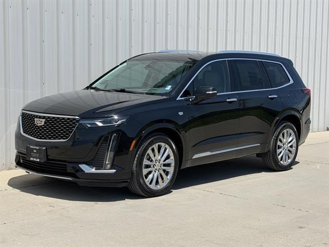 Used 2022 Stellar Black Metallic Cadillac Premium Luxury image 1