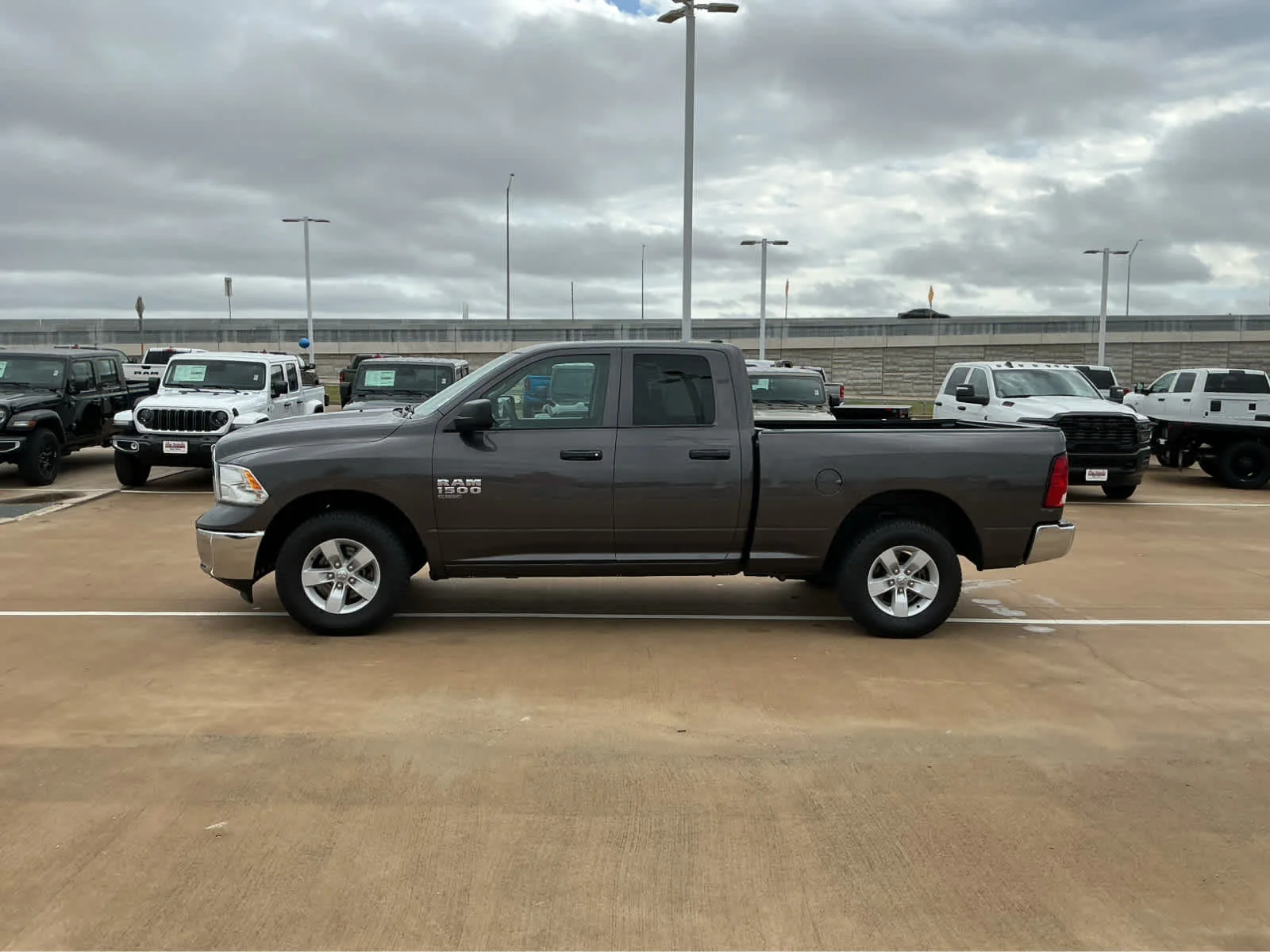 Used 2024 Granite Crystal Metallic Clearcoat Ram SLT image 14