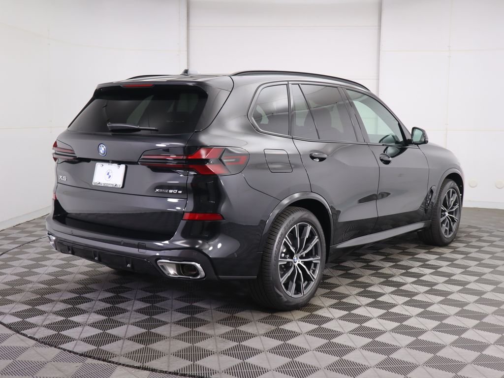 Used 2026 Black Sapphire Metallic BMW xDrive50e image 6