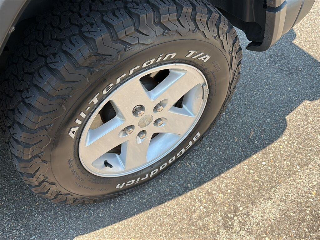Used 2021 Granite Crystal Metallic Clearcoat Jeep Unlimited Sport S image 6