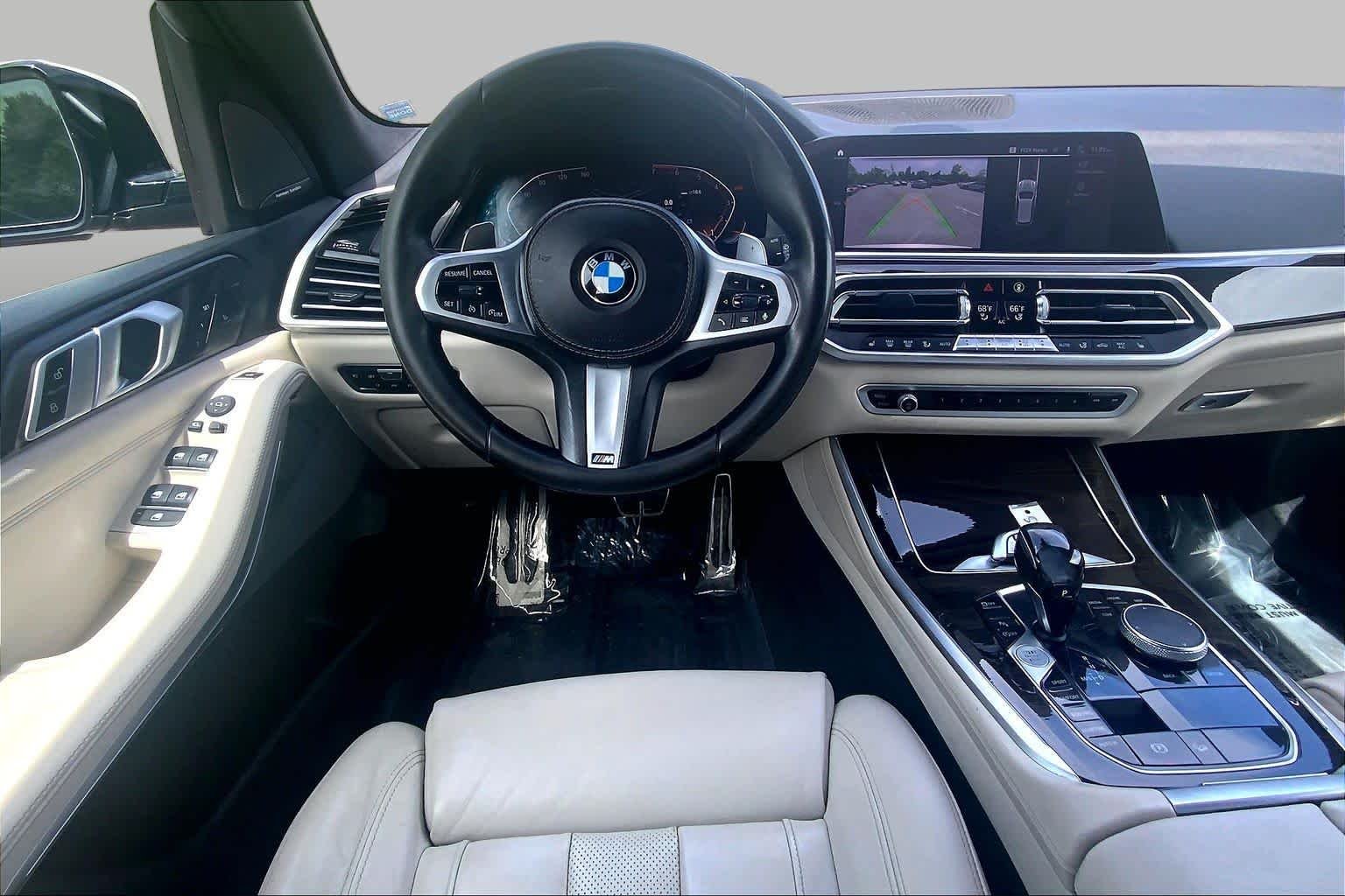 Used 2019 Sunstone Metallic BMW xDrive50i image 6