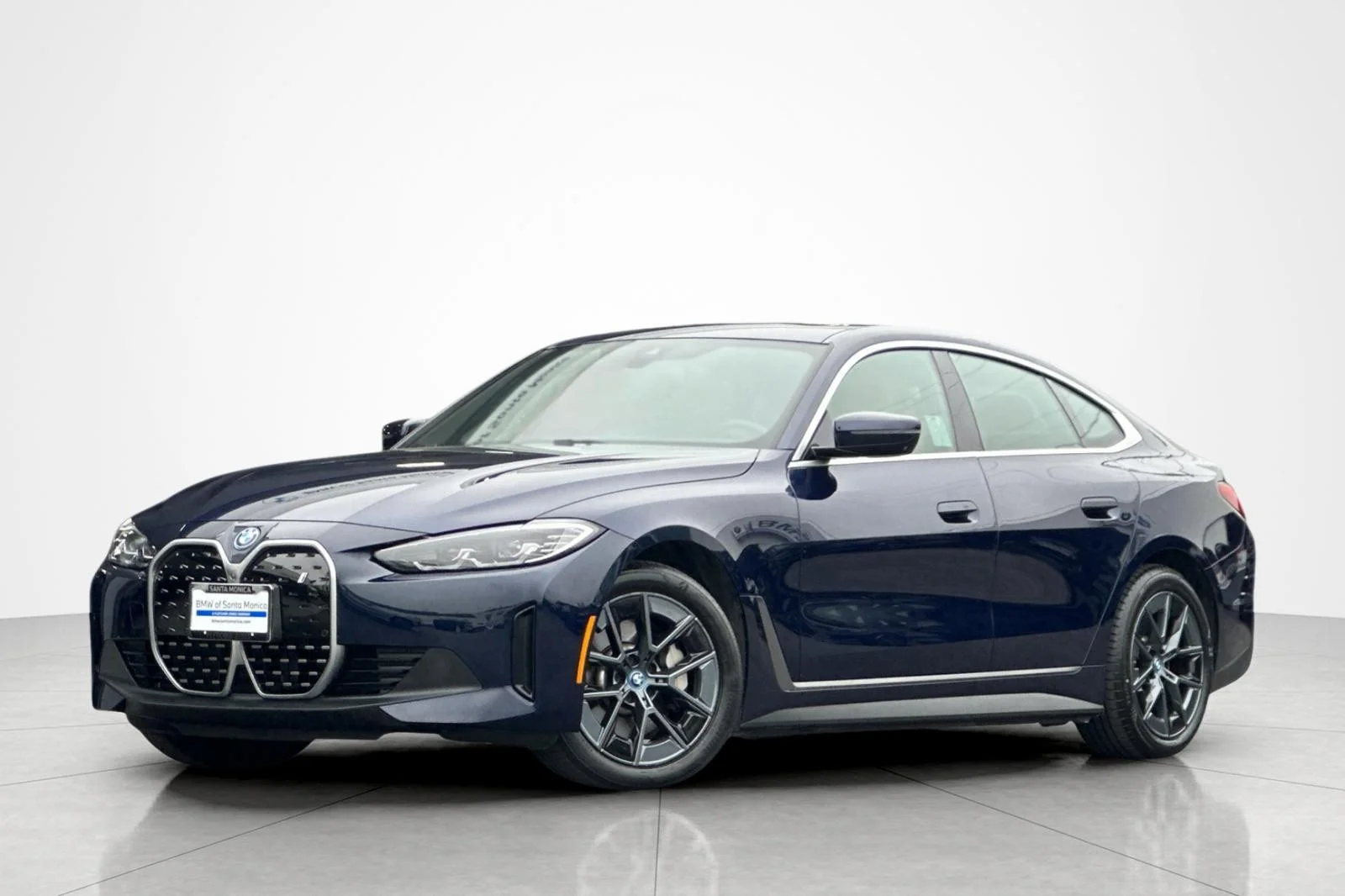 Used 2023 Tanzanite Blue II Metallic BMW eDrive35 image 1