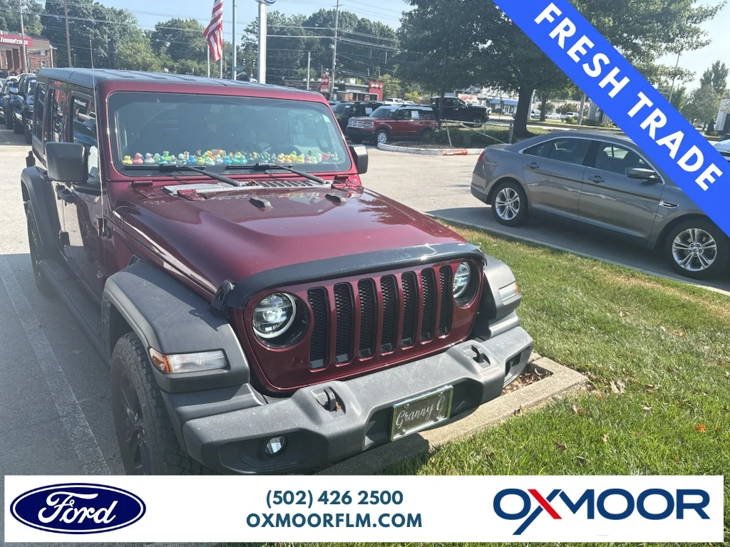 Used 2021 Snazzberry Pearlcoat Jeep Unlimited Sport Altitude image 1