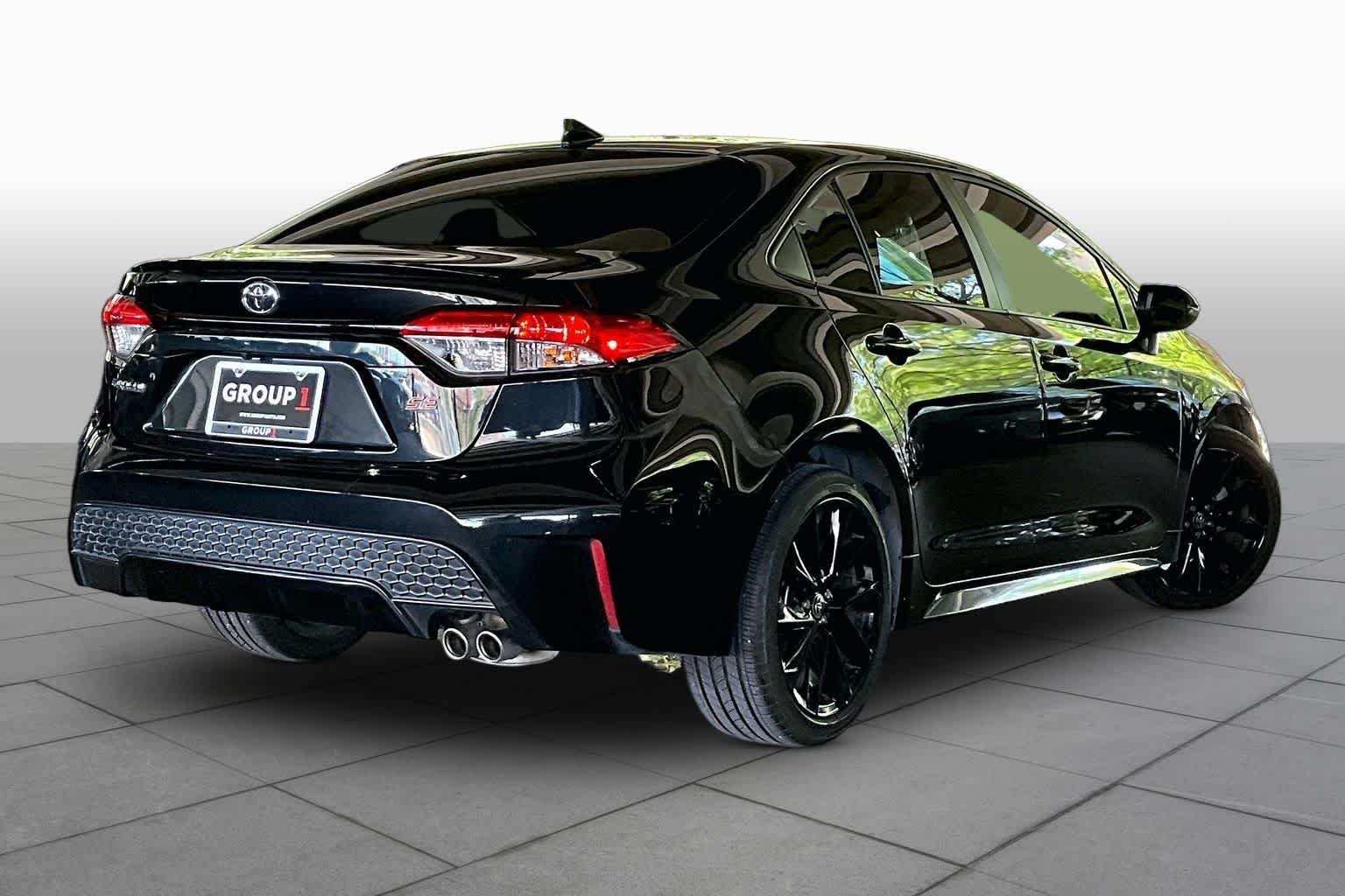 Used 2022 Black Sand Pearl Toyota SE image 12