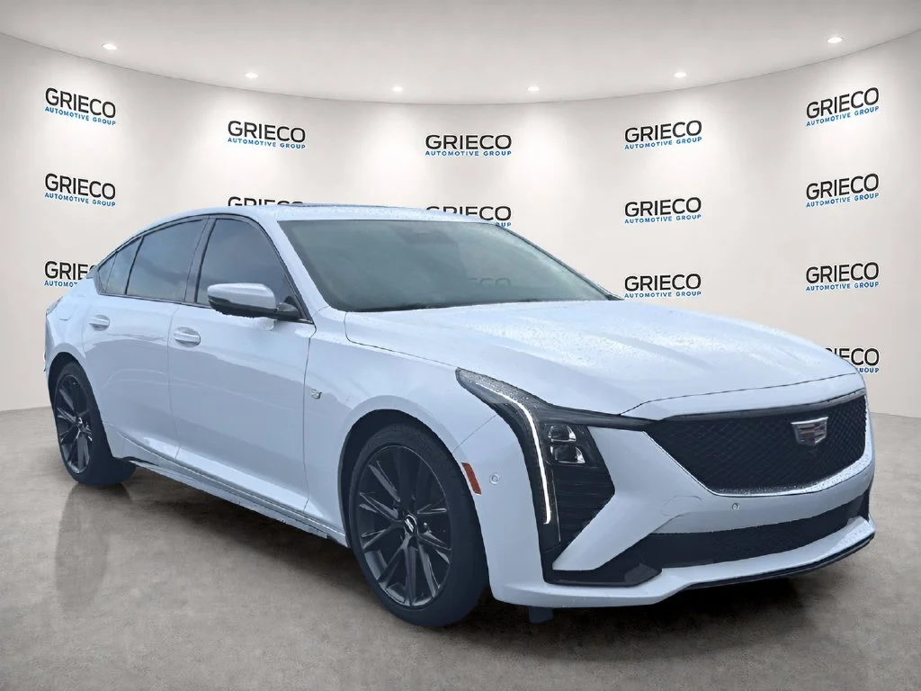 Used 2025 Summit White Cadillac Sport image 1