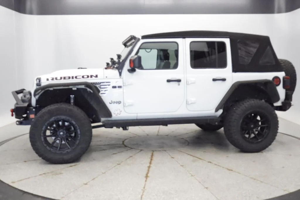 Used 2023 Jeep Wrangler 4-Door Rubicon with VIN 1C4HJXFNXPW504137 for sale in Coon Rapids, Minnesota