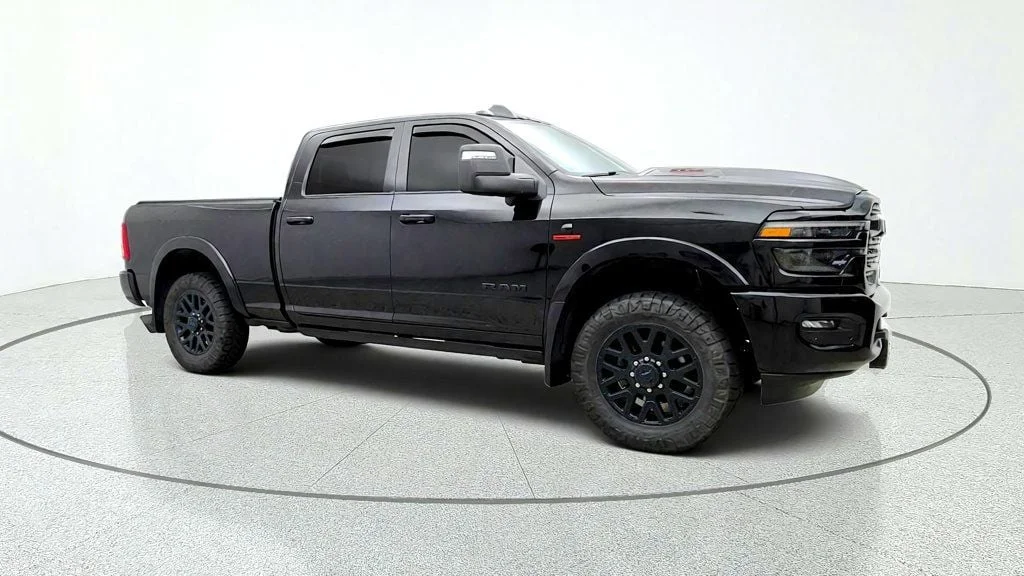 Used 2025 Black Clearcoat Ram Limited 4x4 Crew Cab 6