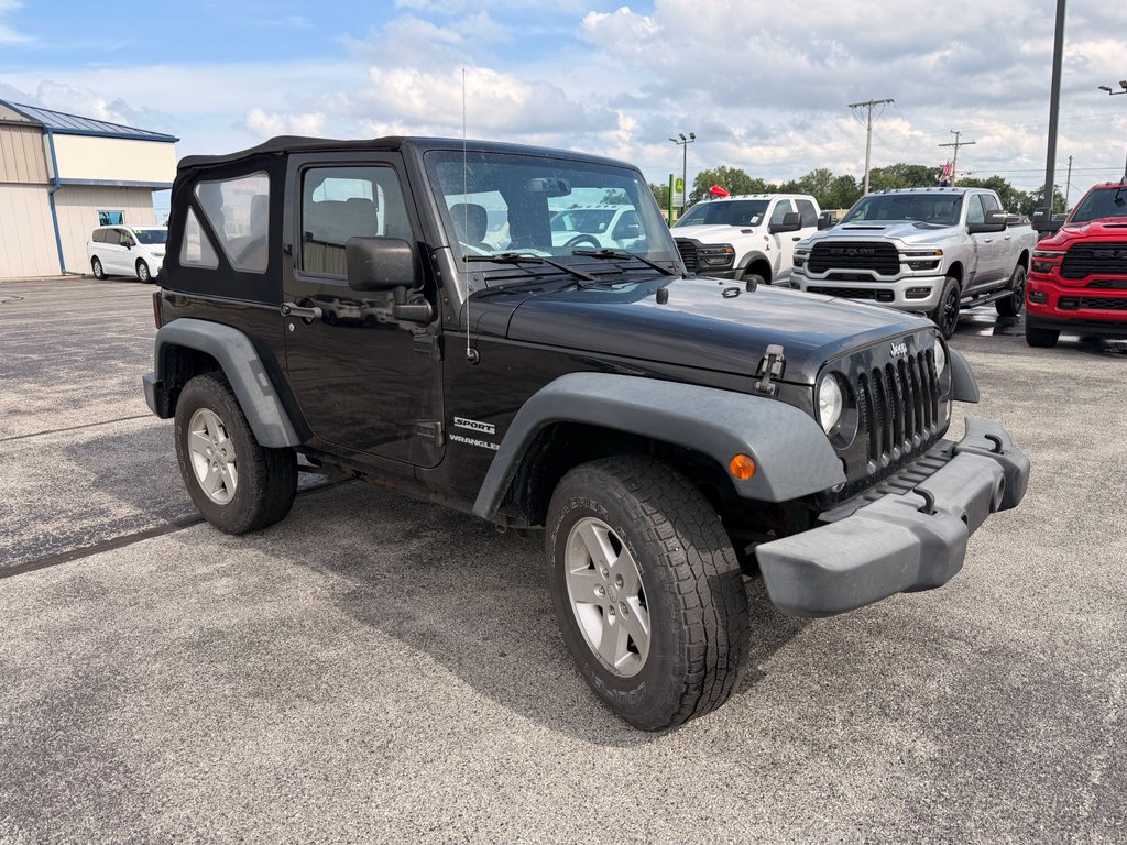 Used 2015 Black Clearcoat Jeep Sport image 2