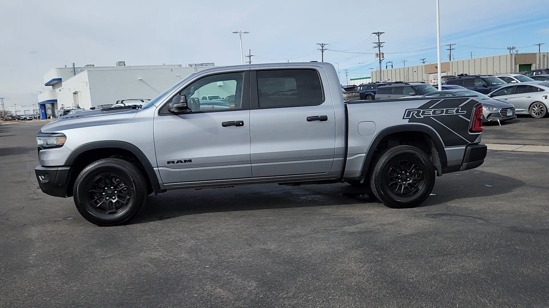 Used 2025 Billet Silver Metallic Clearcoat Ram Rebel image 2