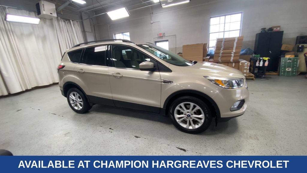 Used 2018 Ford Escape SE with VIN 1FMCU0GD7JUD03213 for sale in Royal Oak, MI