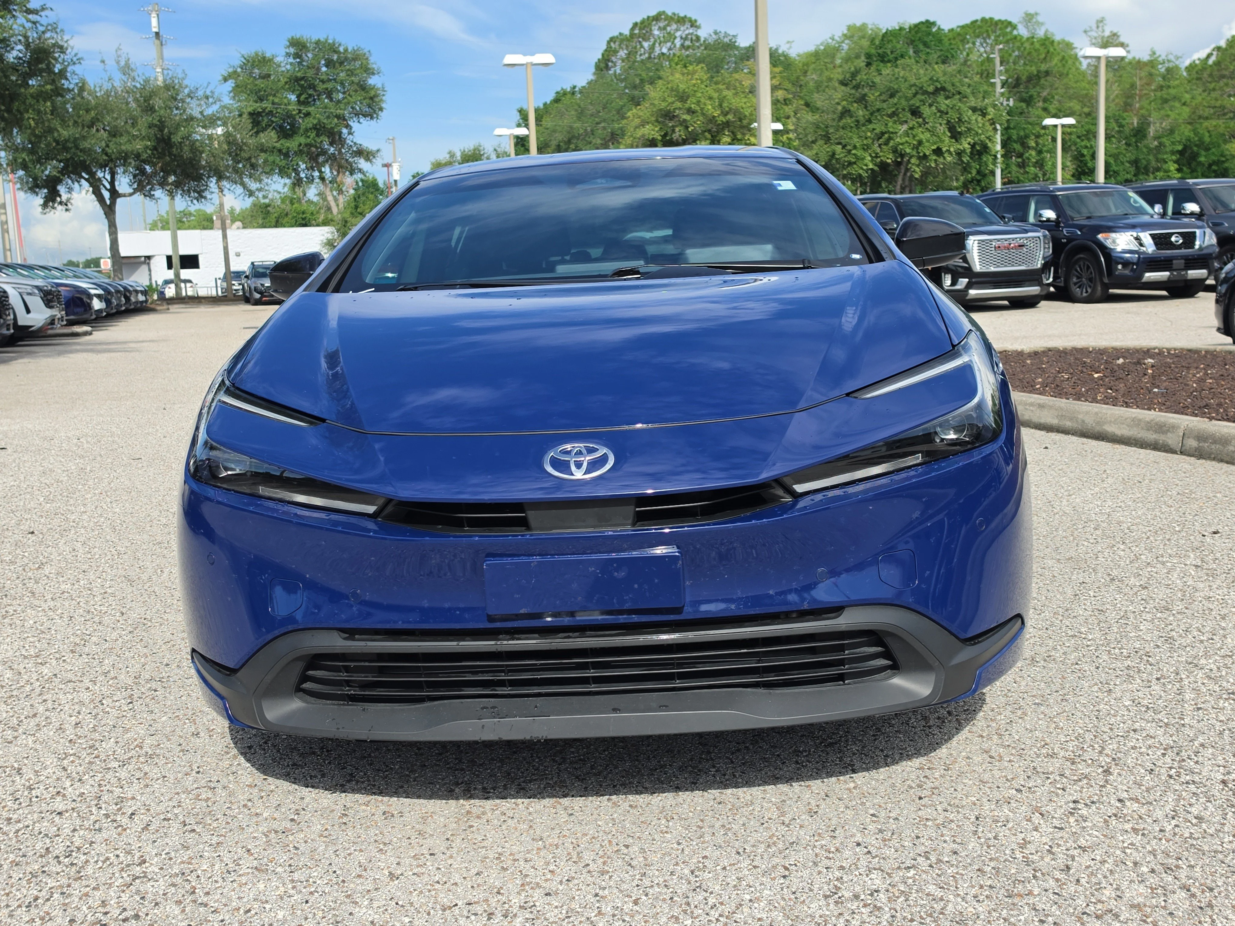 Used 2024 Reservoir Blue Toyota LE image 3