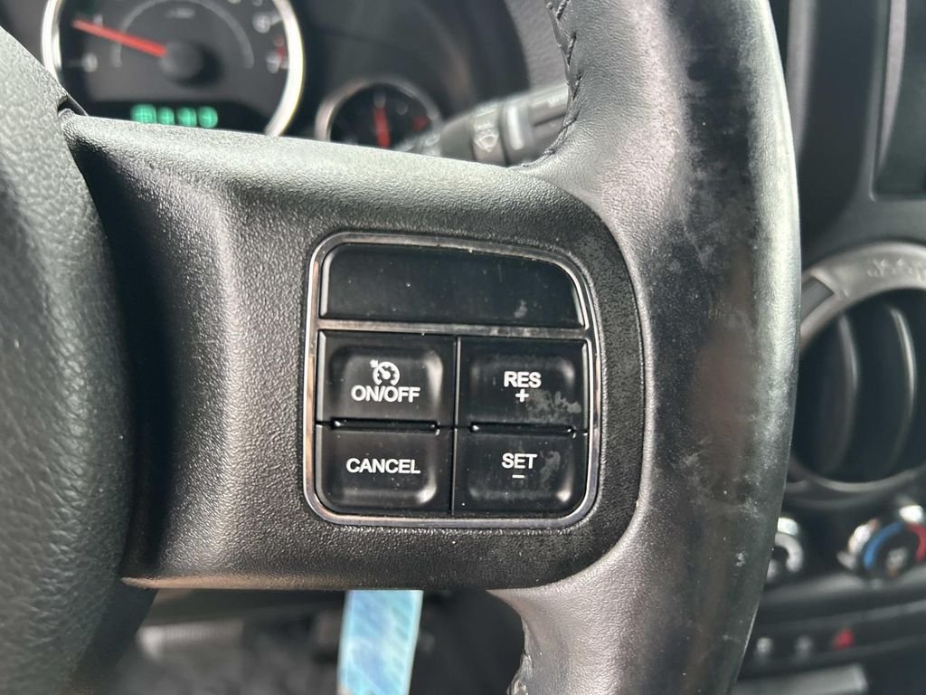 Used 2012 Bright White Jeep Unlimited Sport image 25