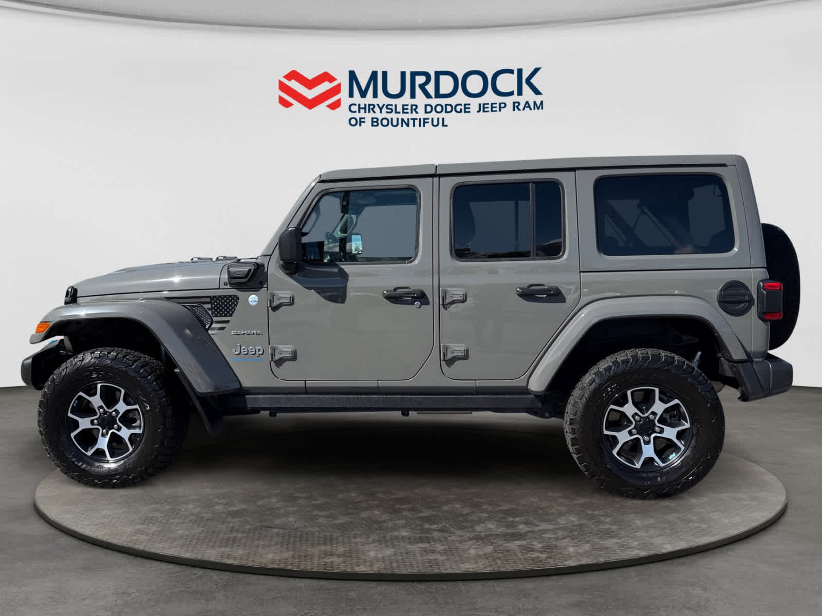 Used 2023 Jeep Wrangler 4xe Sahara 4XE with VIN 1C4JJXP69PW557856 for sale in Logan, UT
