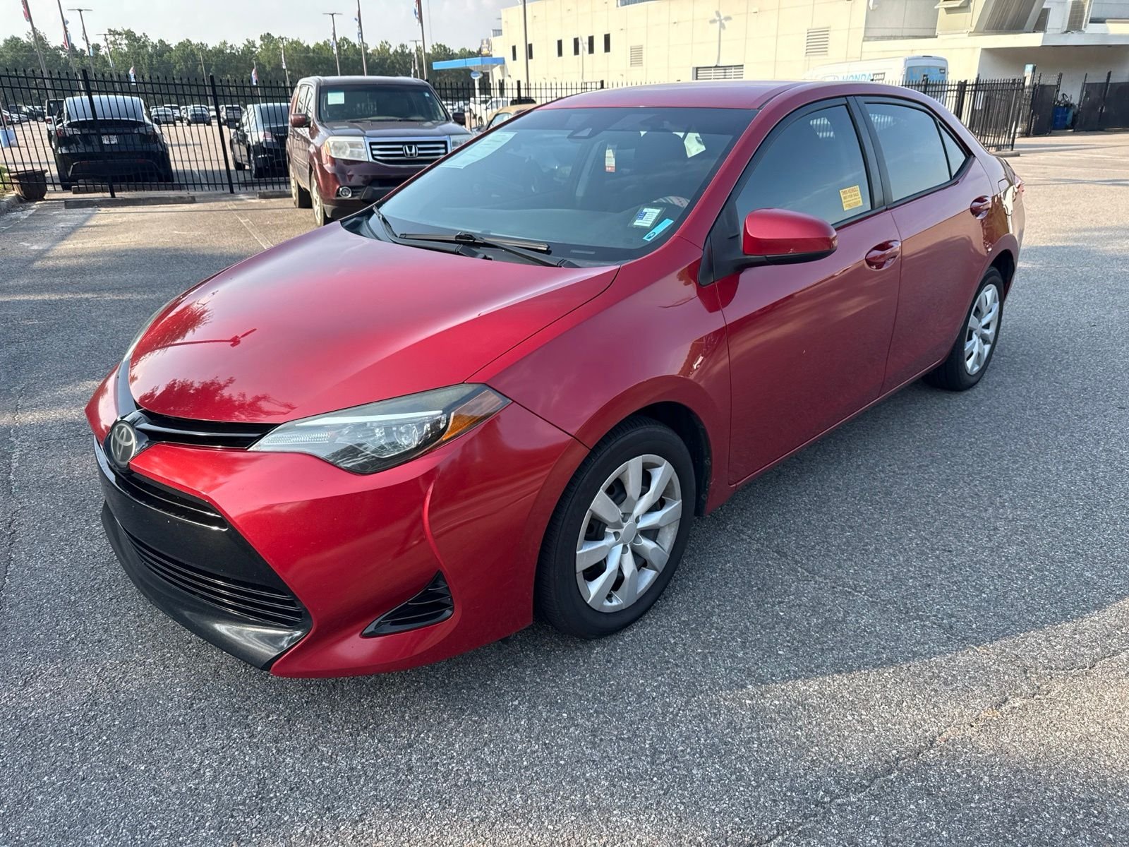 Used 2018 Red Toyota LE image 1
