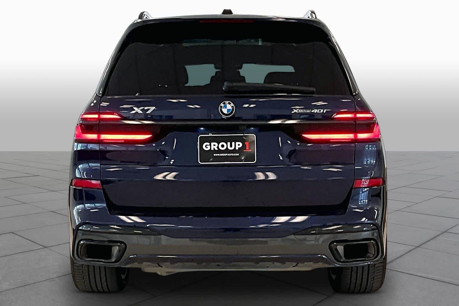 Used 2024 Tanzanite Blue II Metallic BMW xDrive40i image 4