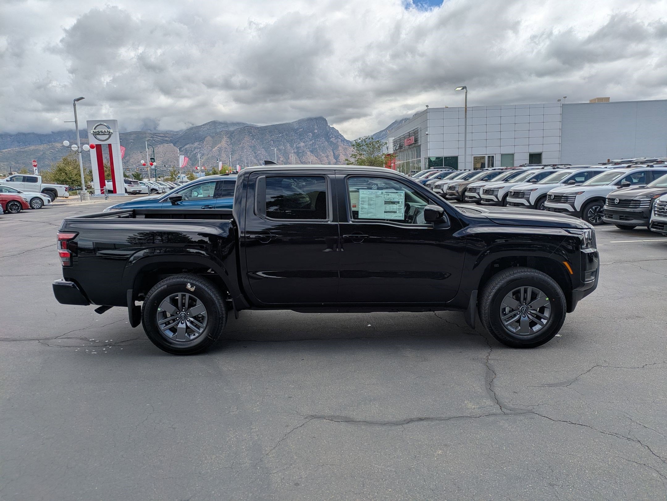 New 2026 Super Black Nissan Crew Cab SV image 2