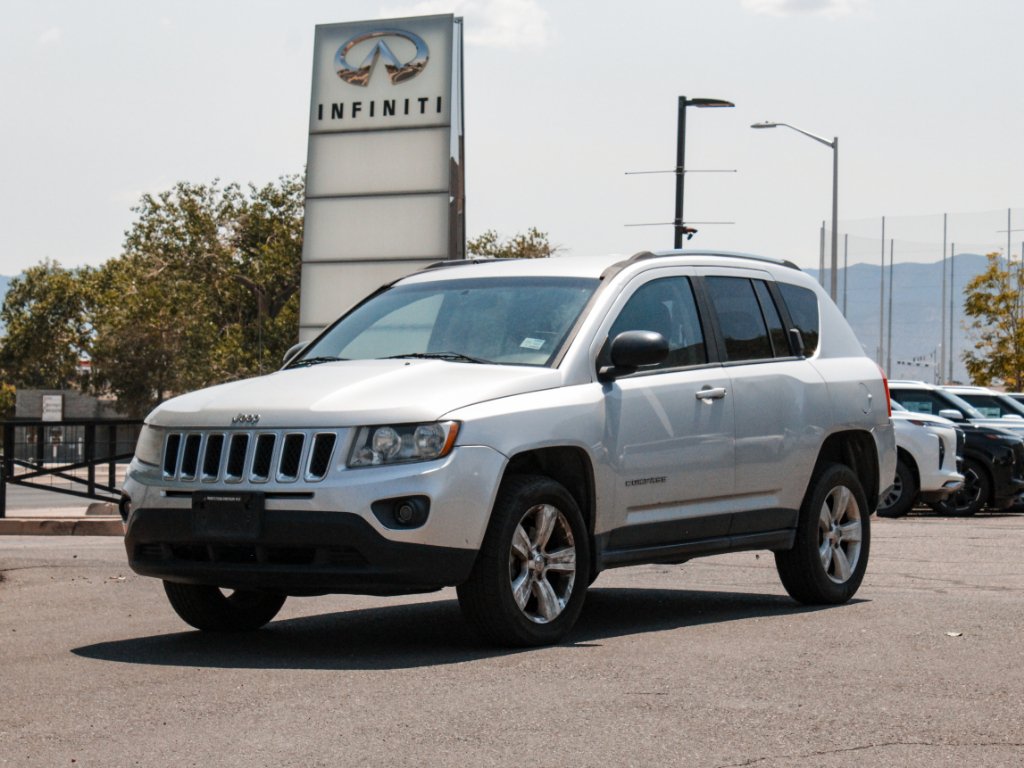 Used 2012 Bright Silver Metallic Clearcoat Jeep Sport image 1